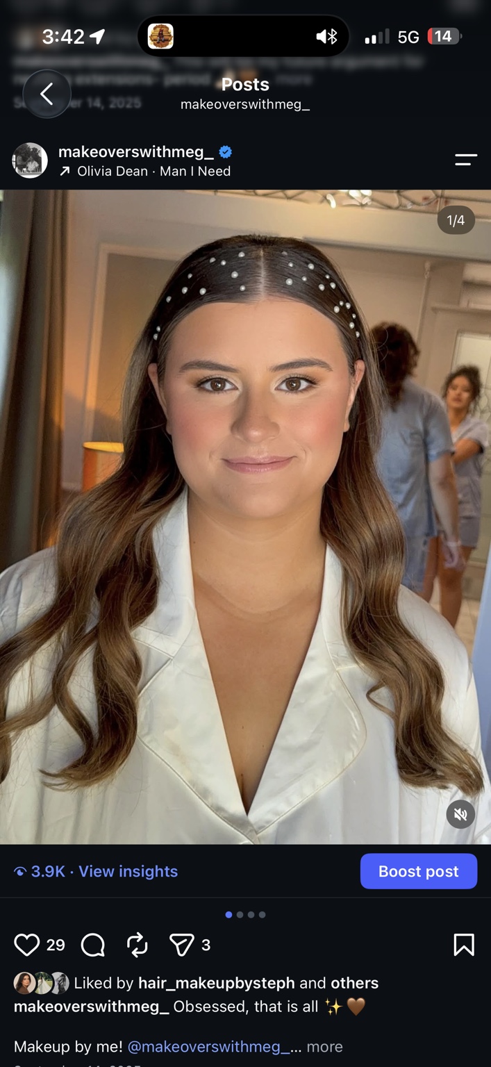 Bride with softly defined eyes, rosy cheeks and loose waves