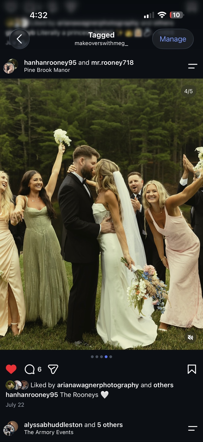 Newlyweds celebrating outdoors with their wedding party